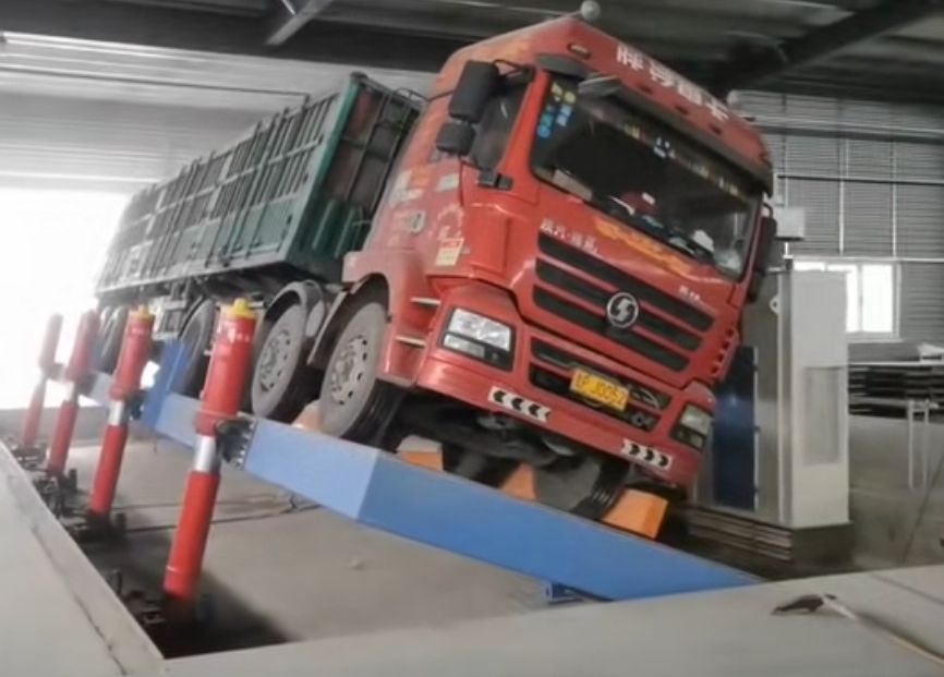 液壓翻板卸車機、糧食散料車輛卸車裝置