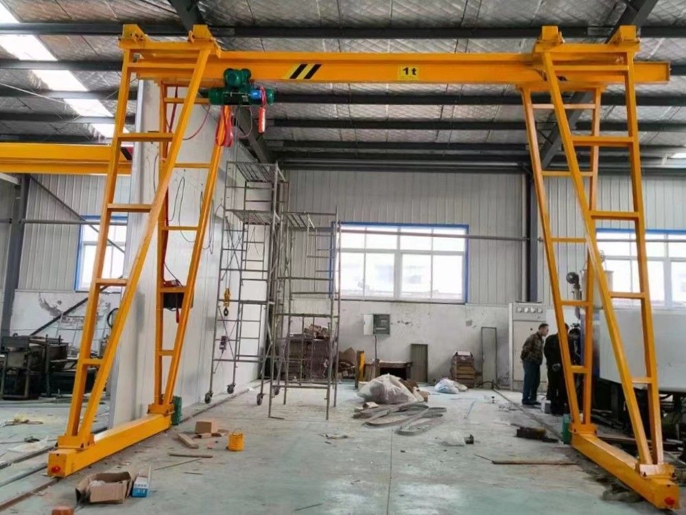 龍門吊廠家生產(chǎn)，手推型/電動型小型門式起重機(jī)制造安裝調(diào)試