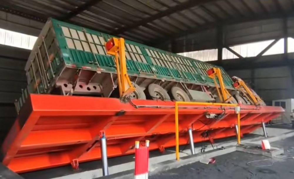 液壓翻板卸車機(jī)、糧食散料車輛卸車裝置