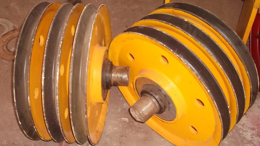 動(dòng)滑輪和定滑輪在起重機(jī)滑輪組中各有什么作用